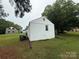 White brick home with a simple design at 317 Heilig Ave, Salisbury, NC 28144