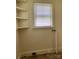 Room with window with blinds and shelving at 317 Heilig Ave, Salisbury, NC 28144