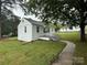 Home showcasing a manicured lawn, walkway and brick elevation at 317 Heilig Ave, Salisbury, NC 28144