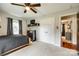 Neutral bedroom featuring a dark ceiling fan, carpet and a closet at 3447 Filbert Hwy, Clover, SC 29710