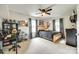 Well-lit bedroom with a teddy bear on the bed and a desk area at 3447 Filbert Hwy, Clover, SC 29710