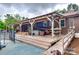 Large wooden deck with covered pergola, ceiling fan and hot tub at 3447 Filbert Hwy, Clover, SC 29710