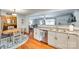 Bright and open kitchen featuring stainless steel appliances and a view of the dining area and living room at 3447 Filbert Hwy, Clover, SC 29710
