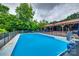 Elevated view of the fenced in pool with mature trees at 3447 Filbert Hwy, Clover, SC 29710
