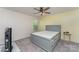 Cozy bedroom features neutral walls, a ceiling fan, and plush carpet at 347 Carolina Hemlock Dr, Locust, NC 28097