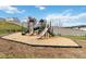 Community playground featuring slides, climbing structures, benches and a wood chip safety ground cover at 347 Carolina Hemlock Dr, Locust, NC 28097
