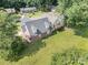 Aerial view of a home with mature trees and spacious backyard at 5111 Clearwater Rd, Charlotte, NC 28217