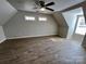 Bedroom with ceiling fan and hardwood flooring. Lots of natural light at 5111 Clearwater Rd, Charlotte, NC 28217