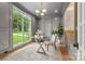 Elegant home office featuring paneled walls, natural light, and stylish decor at 5127 Lansing Dr, Charlotte, NC 28270
