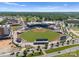 An aerial view of the baseball field captures the active, surrounding community, and the lush green landscape at 5481 Comiskey Aly, Kannapolis, NC 28081