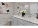 Bathroom featuring a double sink vanity with quartz countertop and decorative accents at 5481 Comiskey Aly, Kannapolis, NC 28081