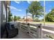 Cozy front porch featuring comfortable seating and a view of the street, perfect for relaxing outdoors at 5481 Comiskey Aly, Kannapolis, NC 28081