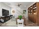 Inviting living room featuring a comfortable sofa, stylish decor, and a custom built-in shelving unit at 5481 Comiskey Aly, Kannapolis, NC 28081