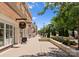 The sidewalk area near the property presents a delightful array of local shops and verdant landscaping at 5481 Comiskey Aly, Kannapolis, NC 28081