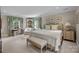 Bedroom featuring neutral decor, large windows, and plenty of natural light at 640 Colville Rd, Charlotte, NC 28207