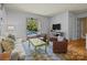 Bright living room with stylish decor and seamless access to the outdoor pool area at 640 Colville Rd, Charlotte, NC 28207