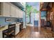 Creative office space with unique tree mural, hardwood floors, and plenty of storage at 640 Colville Rd, Charlotte, NC 28207