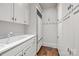 Pantry with custom cabinetry and shelving for ample storage at 640 Colville Rd, Charlotte, NC 28207
