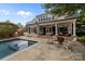 Beautiful backyard with a pool, patio, and outdoor seating area at 640 Colville Rd, Charlotte, NC 28207