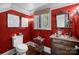 Stylish powder room featuring a vanity and unique decor at 640 Colville Rd, Charlotte, NC 28207