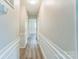 A bright hallway with new floors leads to the home's private rooms at 711 September Ln, Charlotte, NC 28208