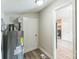 Utility room with water heater at 711 September Ln, Charlotte, NC 28208