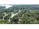 Scenic aerial view highlighting the property's proximity to the lake and surrounding greenery at 7232 Executive Cir, Denver, NC 28037