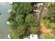 Aerial view showcasing property location relative to lake and neighborhood at 7232 Executive Cir, Denver, NC 28037