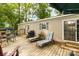 Relaxing deck with outdoor furniture, including lounge chairs, and beautiful surroundings perfect for unwinding at 7232 Executive Cir, Denver, NC 28037