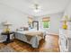 Comfortable bedroom with hardwood floors, a ceiling fan, and neutral décor at 7317 Red Branch Ln, Charlotte, NC 28226