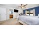 Relaxing bedroom features a ceiling fan, TV, desk, window, and a full bed at 826 Sinclair Dr, Monroe, NC 28112