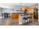 Features an island, hardwood floors, stainless steel appliances, and wood cabinets at 826 Sinclair Dr, Monroe, NC 28112