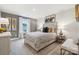 Comfortable bedroom with a patterned quilt, soft carpet, and natural light from the window at 951 Exeter Dr, Sherrills Ford, NC 28673