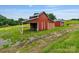 Rustic barn with a loft and plenty of room for storage, adding to the property's charm at 956 Stony Point Rd, Kings Mountain, NC 28086