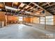 Large basement space with concrete floor, exposed utilities, and unfinished walls awaiting transformation at 956 Stony Point Rd, Kings Mountain, NC 28086