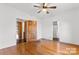 Bright bedroom features hardwood floors and ample closet space for storage at 956 Stony Point Rd, Kings Mountain, NC 28086
