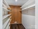 Organized closet featuring custom shelving and wood accents, providing ample storage and a touch of elegance at 956 Stony Point Rd, Kings Mountain, NC 28086