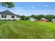 Charming home with well-maintained lawn and outbuildings, creating a picturesque and inviting country atmosphere at 956 Stony Point Rd, Kings Mountain, NC 28086
