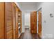 Hallway features wood-look floors, closet storage and access to the bathroom at 956 Stony Point Rd, Kings Mountain, NC 28086