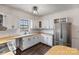 Kitchen featuring white cabinets, stainless steel appliances, and wood countertops at 956 Stony Point Rd, Kings Mountain, NC 28086