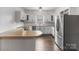 Kitchen featuring white cabinets, wood countertops, and stainless steel refrigerator at 956 Stony Point Rd, Kings Mountain, NC 28086