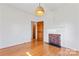 Living room with wood floors and white brick fireplace at 956 Stony Point Rd, Kings Mountain, NC 28086