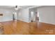 Open-concept living room with hardwood floors and natural light, perfect for entertaining at 956 Stony Point Rd, Kings Mountain, NC 28086