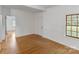 Cozy living room with hardwood floors, neutral paint, and natural light at 956 Stony Point Rd, Kings Mountain, NC 28086