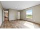 Bedroom with vinyl wood flooring, natural light, and neutral walls provide comfortable space at 977 Myers Mill Rd, Olin, NC 28660
