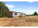 Well-maintained home featuring an inviting entrance and simple landscaping at 977 Myers Mill Rd, Olin, NC 28660
