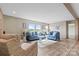 Bright living room showcasing comfortable seating, neutral decor, and abundant natural light at 977 Myers Mill Rd, Olin, NC 28660