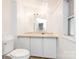 A bathroom with white cabinets, a matching toilet, and a sink at 10 Cedarvilla Dr, Rock Hill, SC 29730
