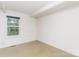Plain bedroom with single window and aged wall panels, with weathered trim and overhead light at 10 Cedarvilla Dr, Rock Hill, SC 29730