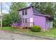 Charming two story home painted purple, with a dark roof and a well maintained yard with green grass at 10 Cedarvilla Dr, Rock Hill, SC 29730